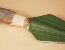 Completed survival spear with bound broadhead