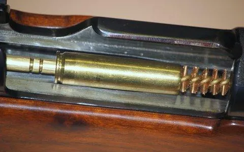 A quick-detachable hook swivel attached to a rifle stud